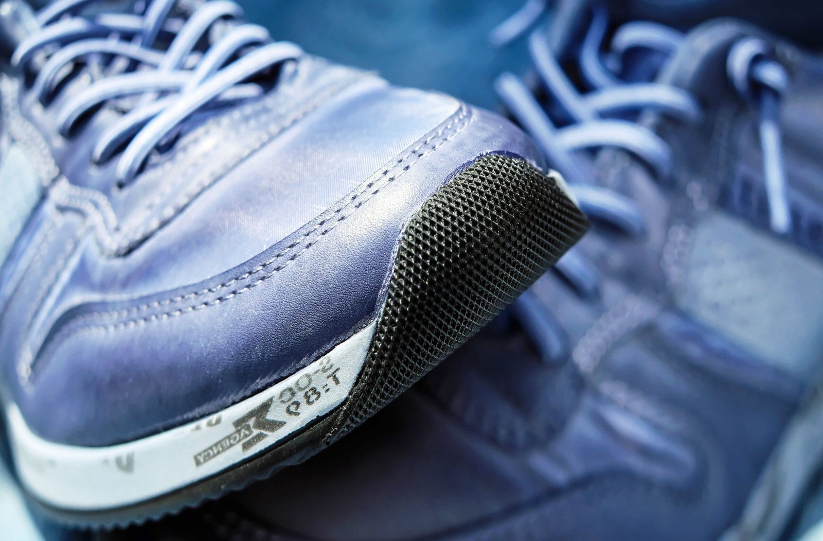 TPU footwear material for low-temperature flex-resistant ink